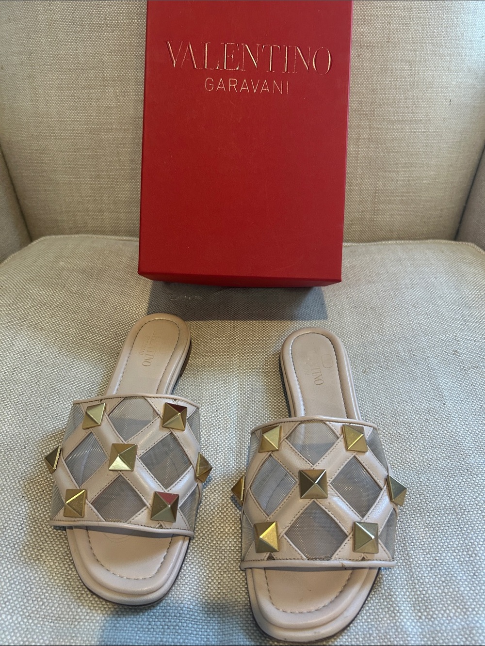 Valentino Garavani Beige Slide Sandals with Gold Rockstuds